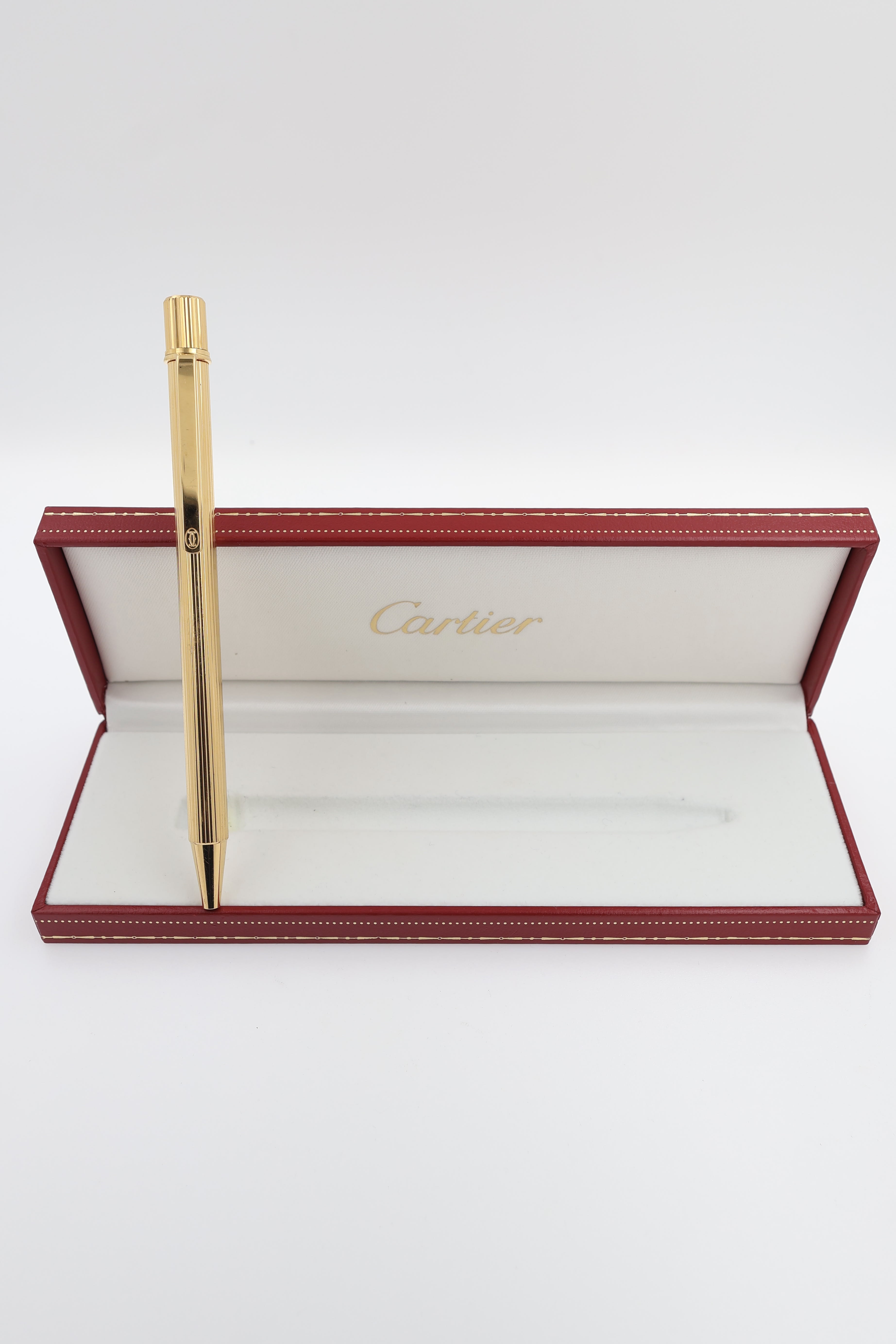 Cartier Must de Cartier textured gold finish ballpoint pen view 1